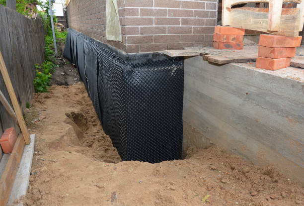 Happy homeowners after waterproofing job in Rockwood
